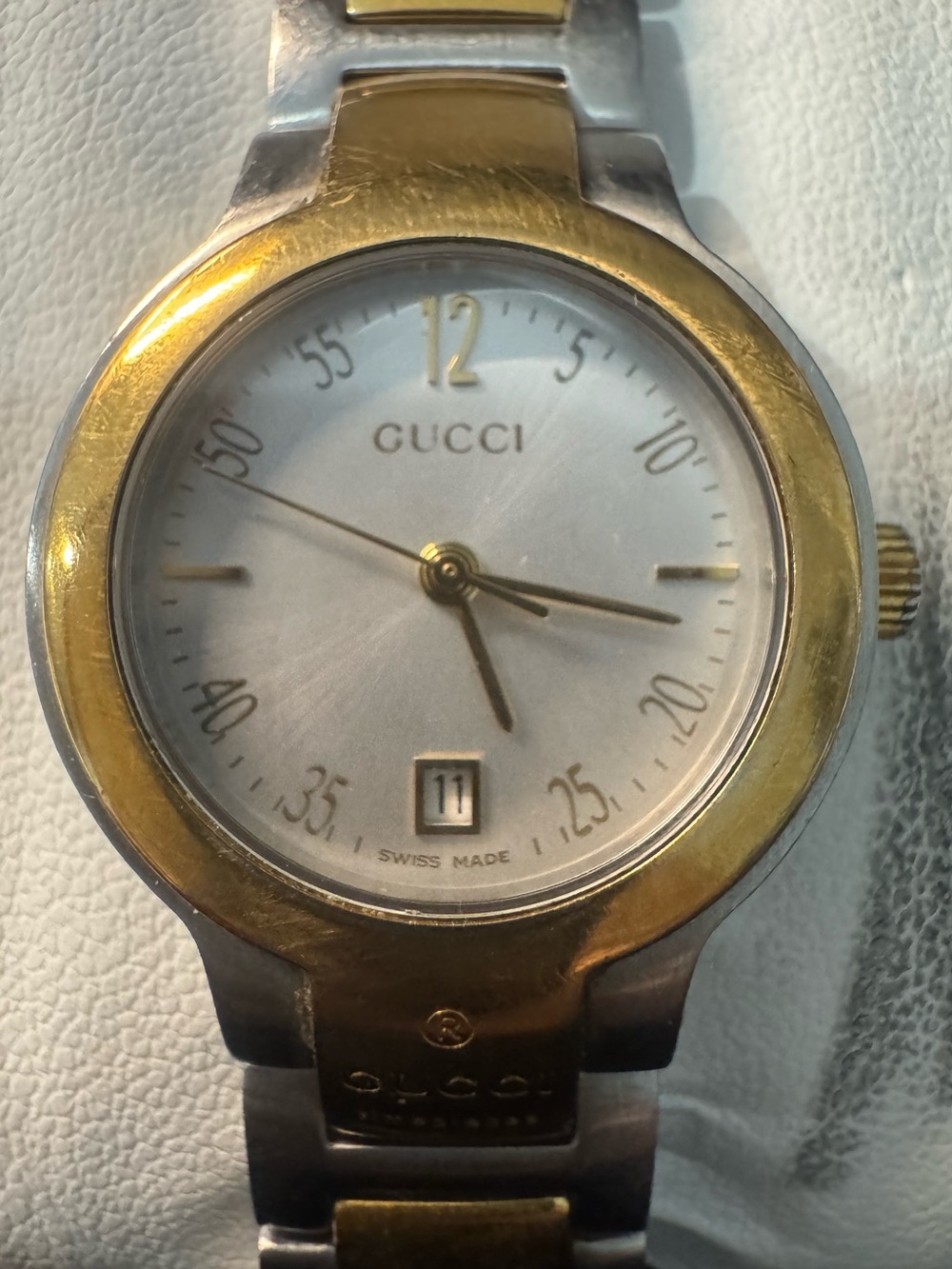 #160 Gucci woman’s Two-Tone Gold and Silver Bracelet Watch